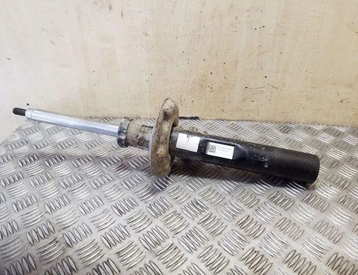 VOLKSWAGEN Caddy 3 generation (2004-2015) Амортизатор передний левый 1T0413031HQ 26205965