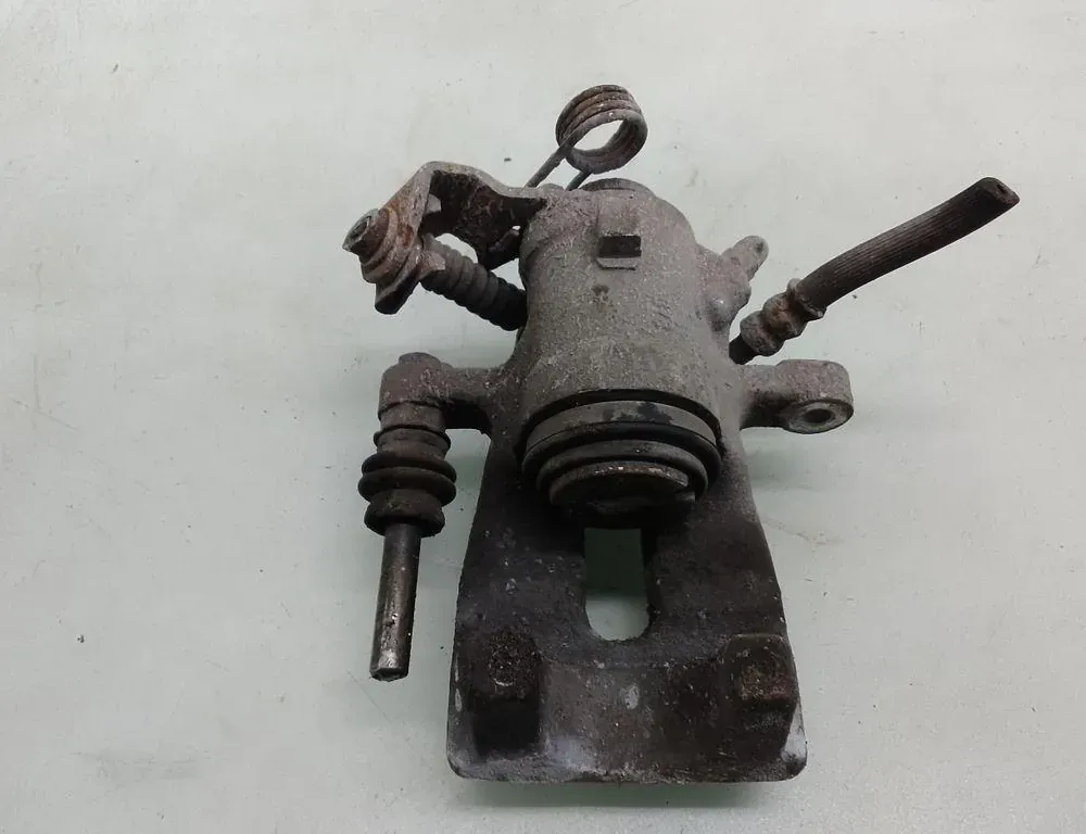 OPEL Zafira A (1999-2003) Задній лівий гальмівний супорт 35087720