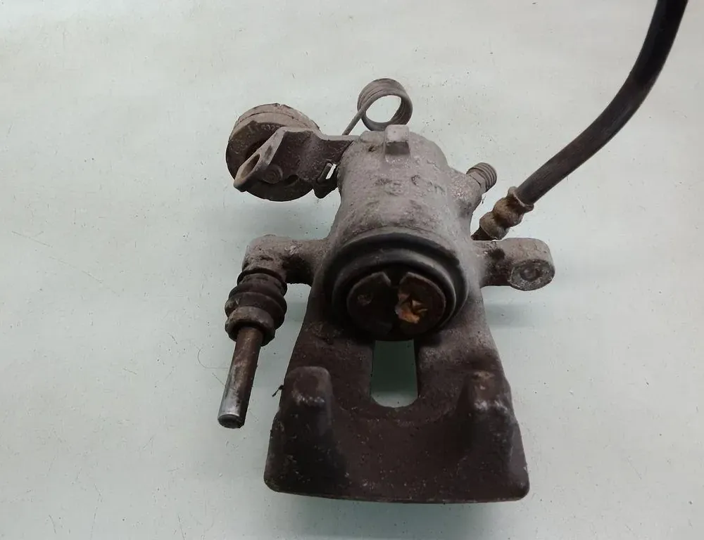 OPEL Zafira B (2005-2010) Задній лівий гальмівний супорт 35082986