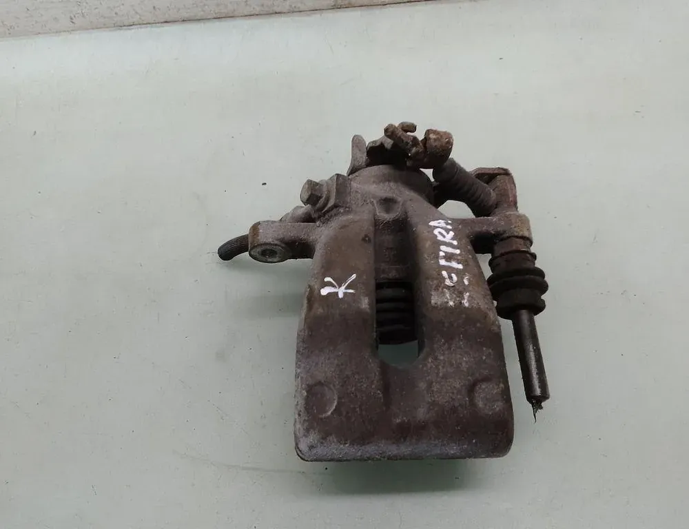 OPEL Zafira A (1999-2003) Задній лівий гальмівний супорт 35087720